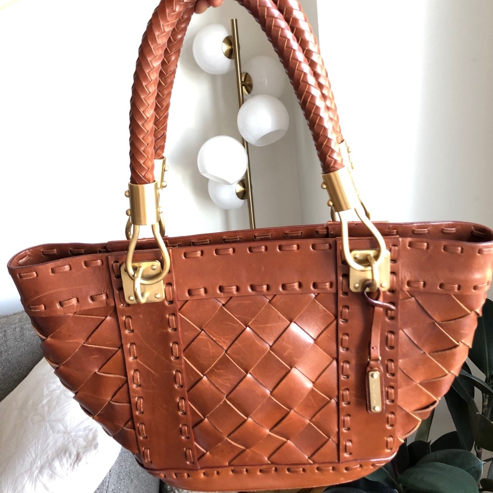 Michael Kors “Santorini” cognac leather woven tote